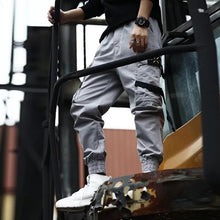 Load image into Gallery viewer, Men Cargo Pants Black Ribbons Block Multi-Pocket 2020 Harem Joggers Harajuku Sweatpant Hip Hop Casual Male Trousers
